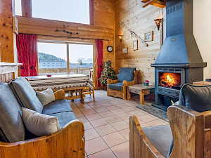 Chalet Piccola Pietra Frankrijk woonkamer met open haard